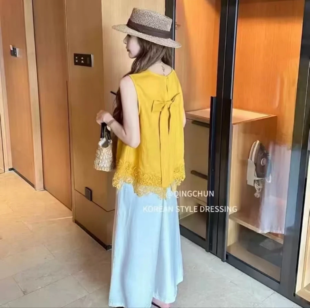 下摆蕾丝蝴蝶结上衣86399