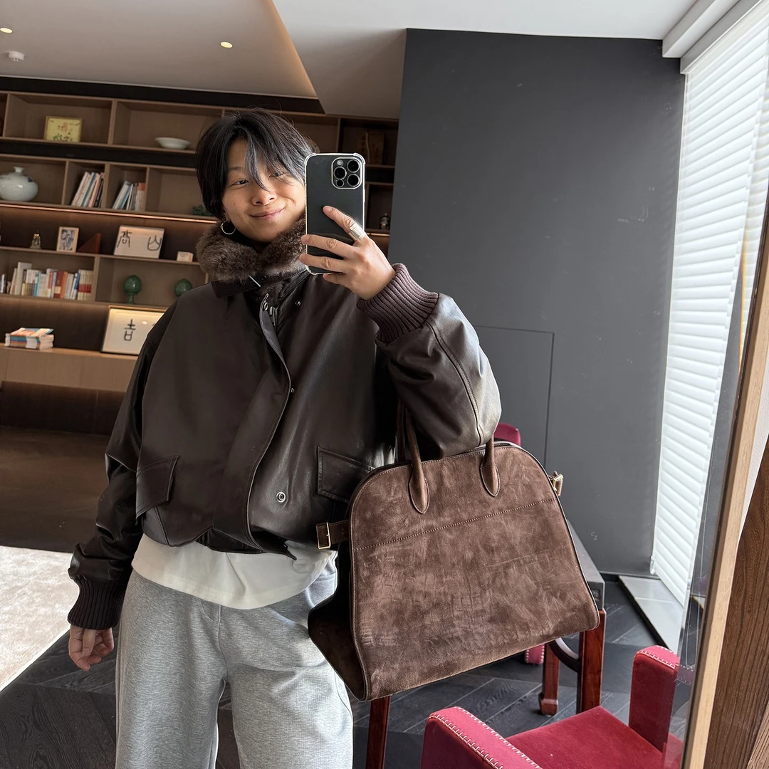 蓝豚豚“邂逅暖意”山羊绒毛领软糯质感皮衣廓版骆驼绒真皮短外套