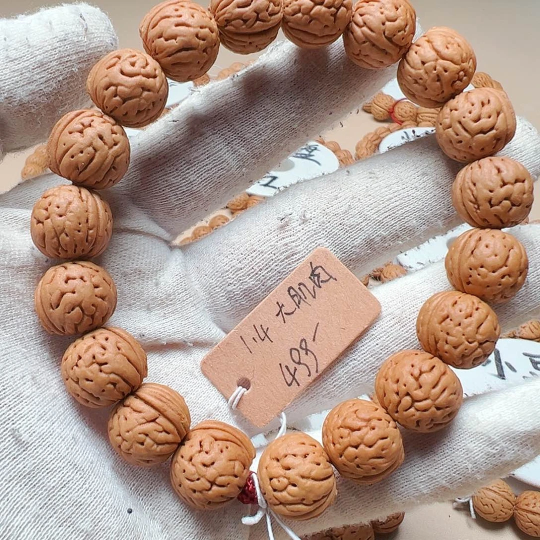 A***W手串桃核1.47红皮大肌肉精品