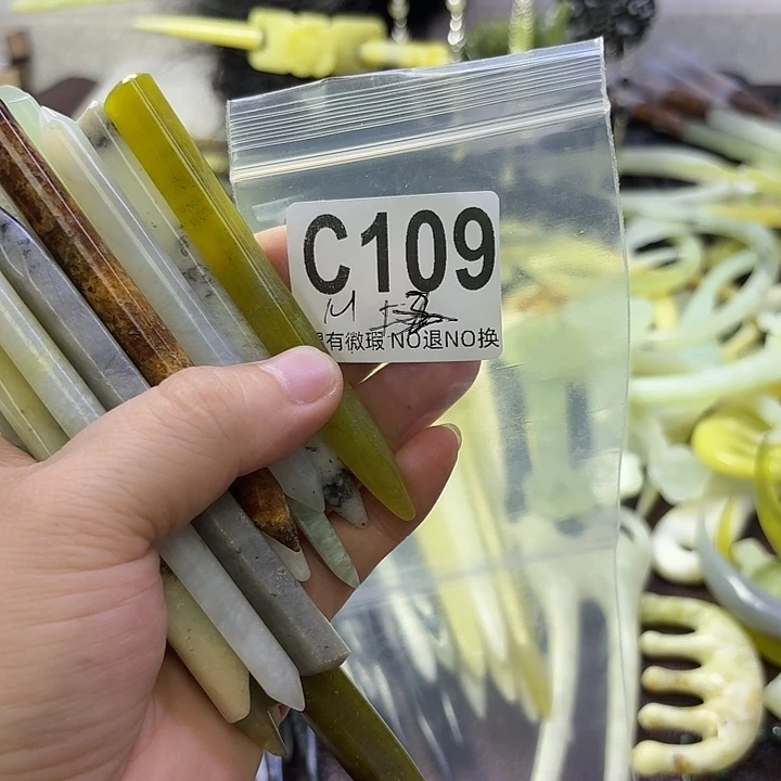 兮***木合金蛇纹石玉发饰