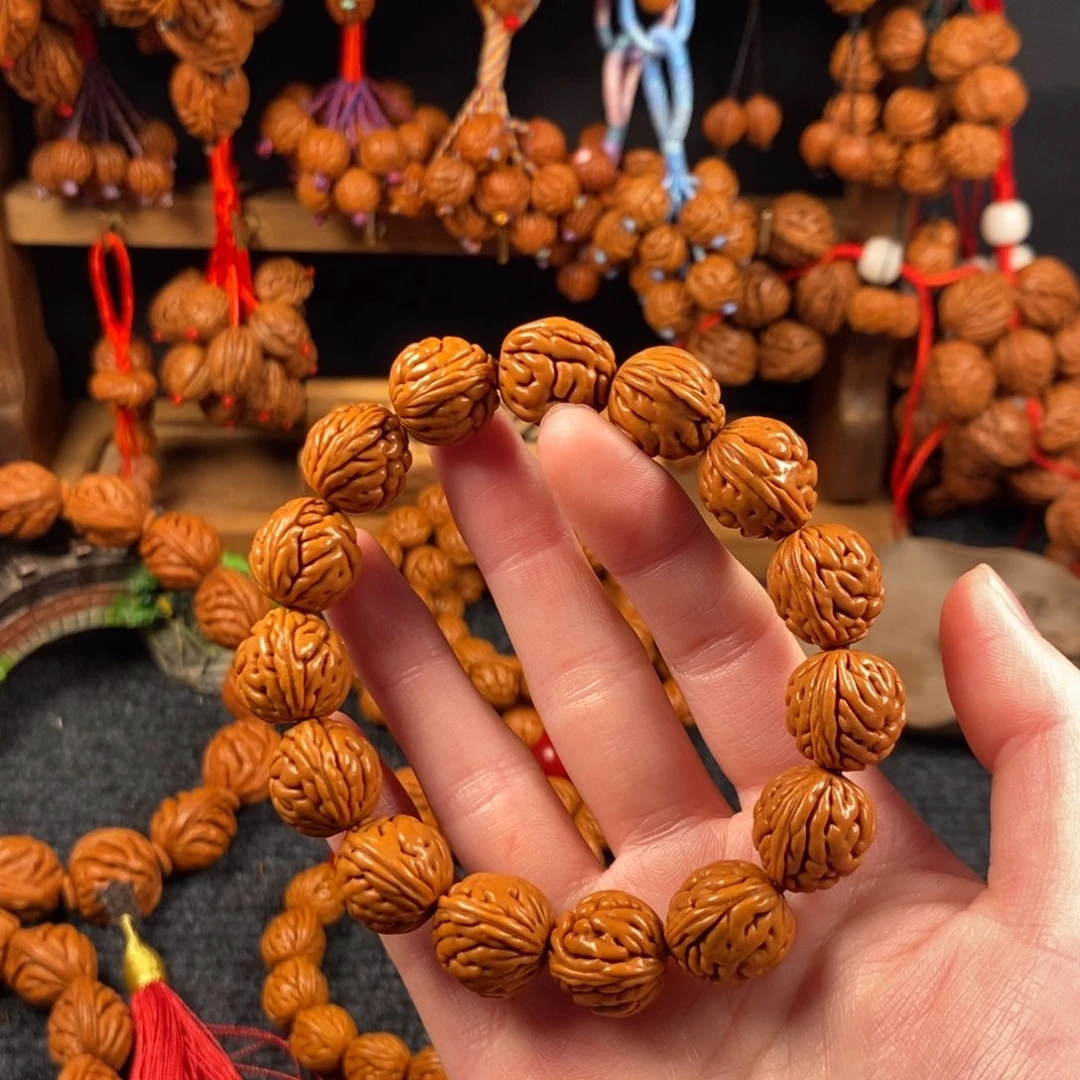 吊坠桃核桃枭手串