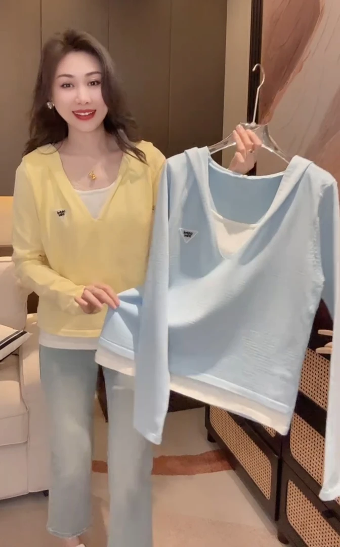 欧货衣服撞色拼接假两件针织衫女春季2025款独特漂亮初春连帽上衣