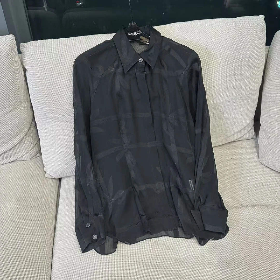 慕溢-25早春黑色提花蝴蝶结翻领透衬衣