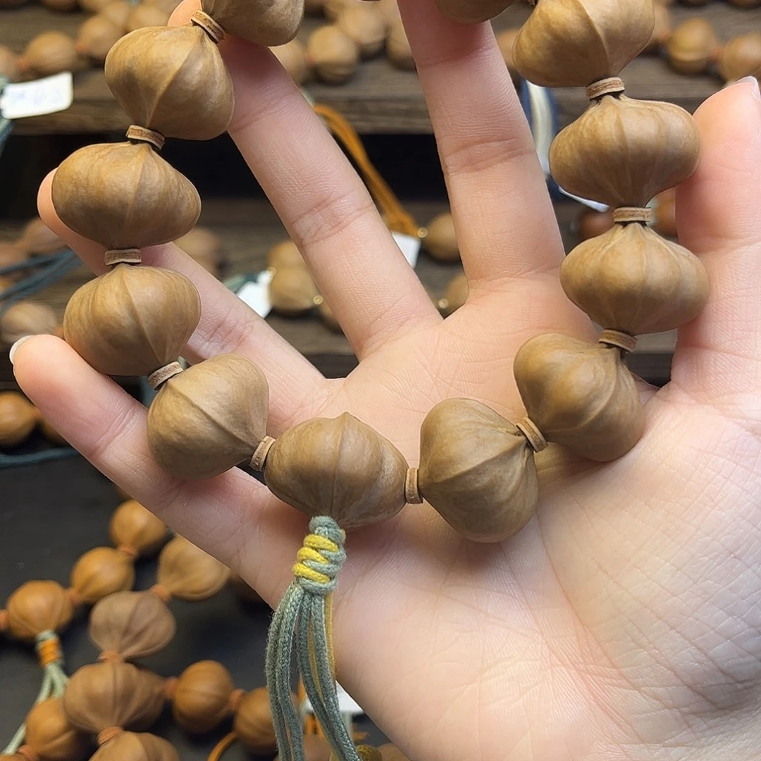 纪***住橄榄核手串/手链004 25×21四花