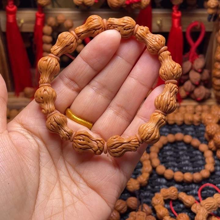 将***往木质类龙纹桃枭挂件