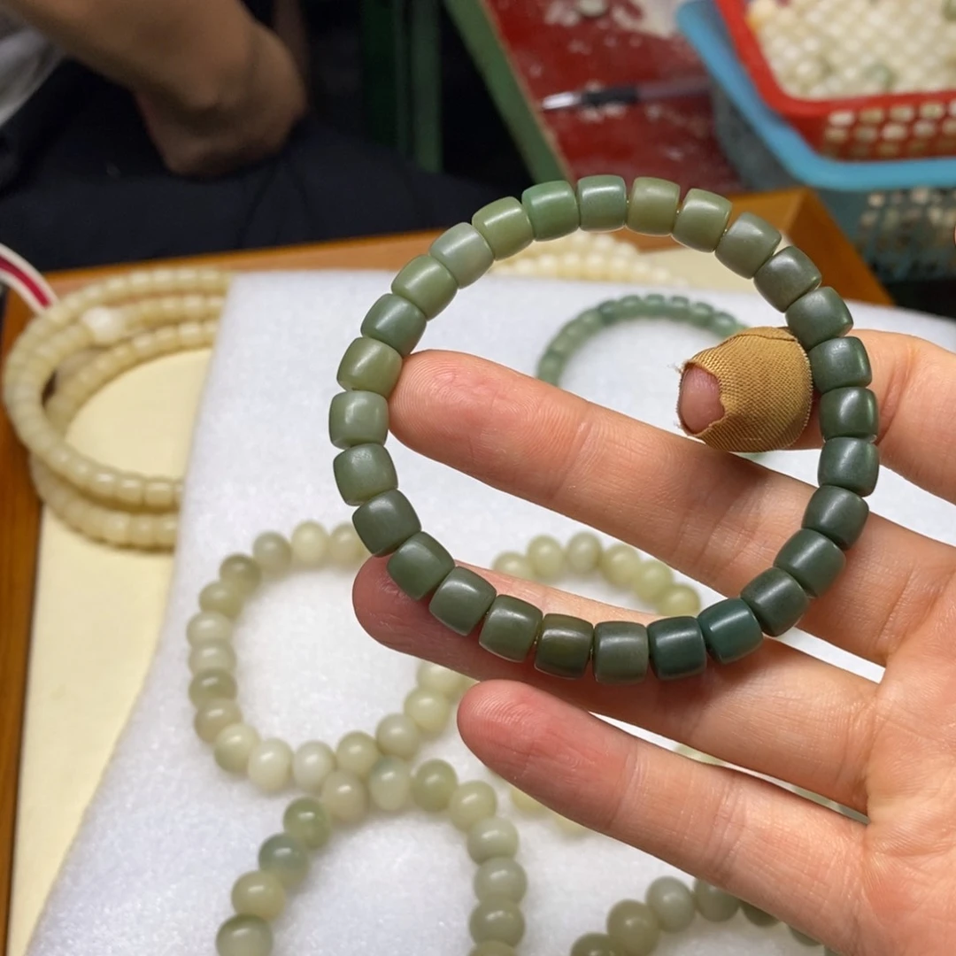 赵***帛菩提根/象牙果把件赵