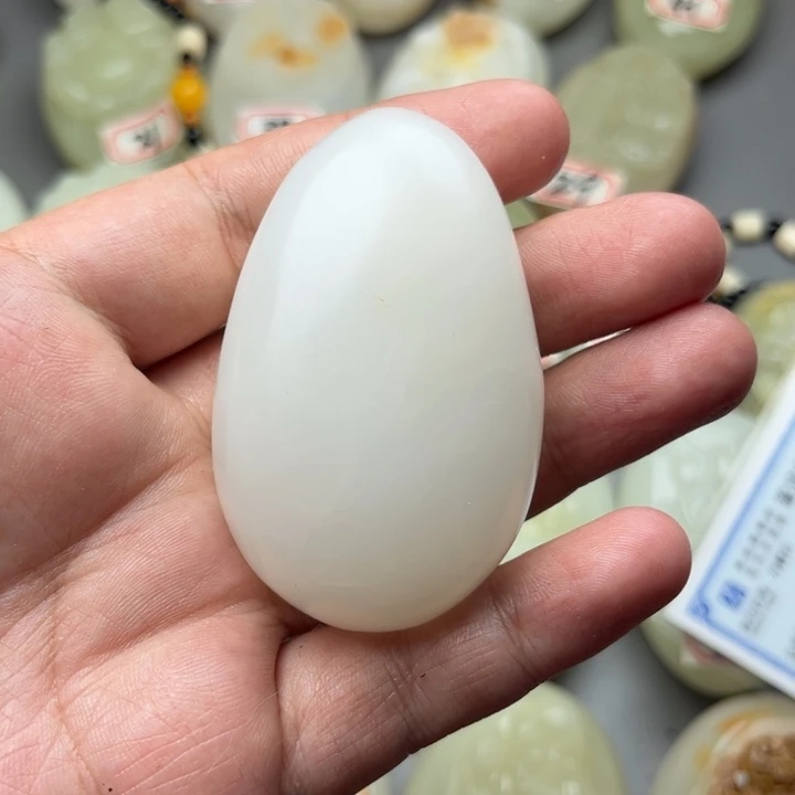 游*彪石材方解石手把件