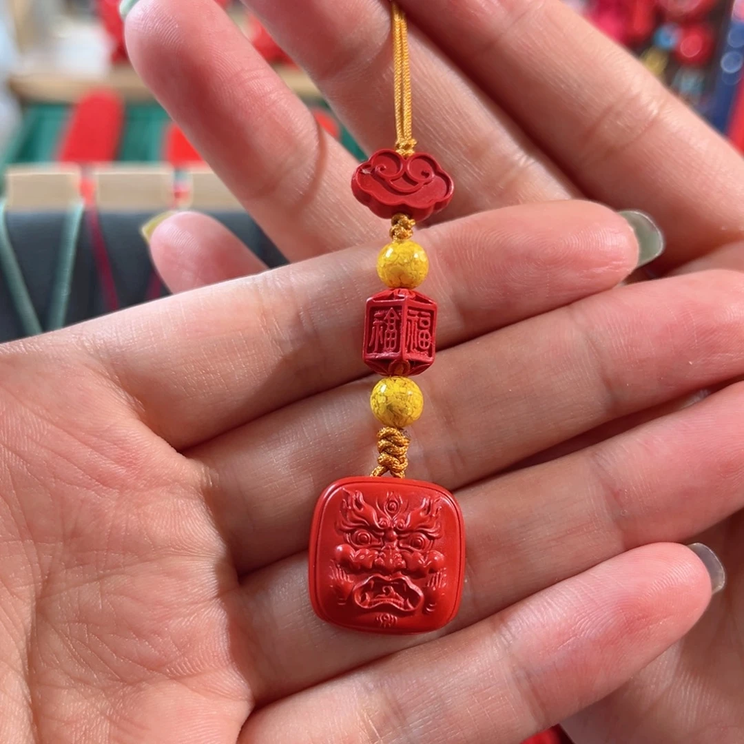 天然辰砂含辰砂工艺品黄财神手机坠