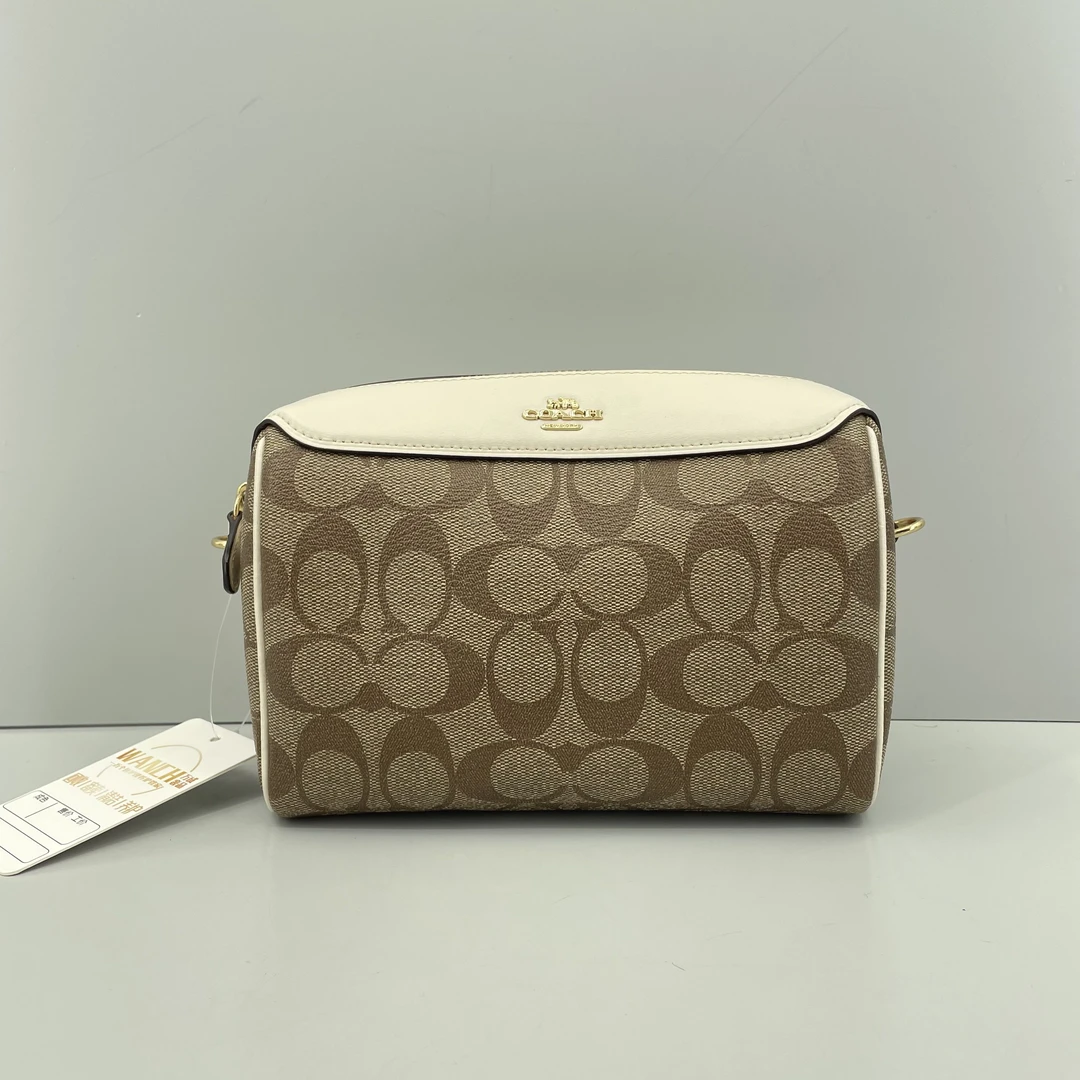 95新 COACH/蔻驰 白拼老花枕头包19*15*9cmE021510