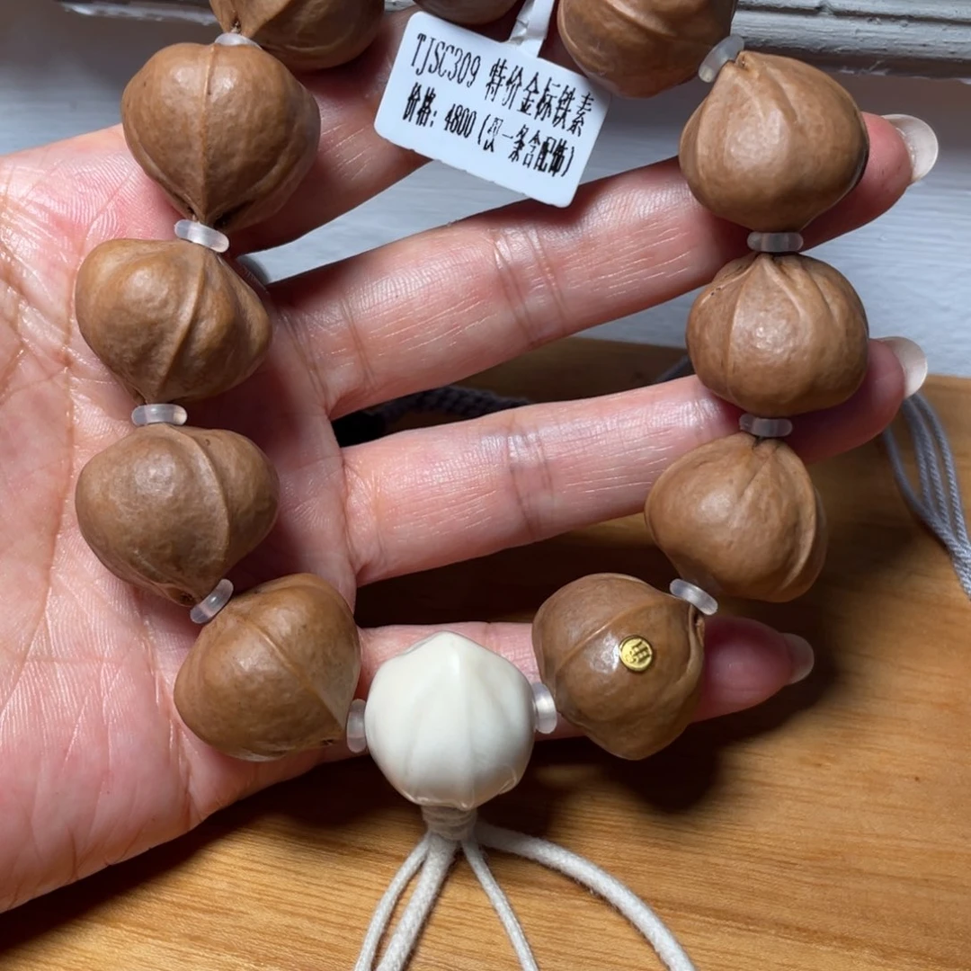 橄榄核吊坠金标铁素