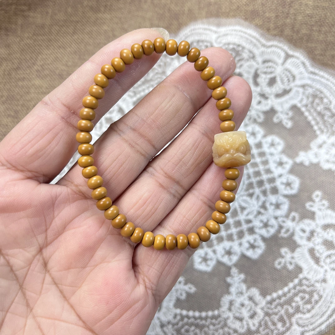 新品天然橄榄核苹果珠可爱配饰菩提炭烧醒狮单圈手链盘玩饰品