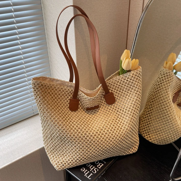 编织草编包包女洋气2025新款时尚韩国网红单肩水桶包海边沙滩包