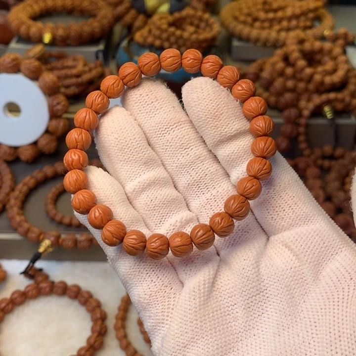 慈***舒桃核手串秦岭龙纹