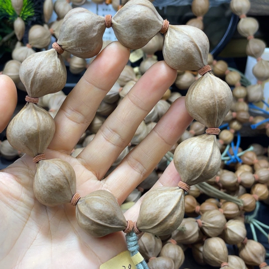 莫***名橄榄核吊坠2430铁核