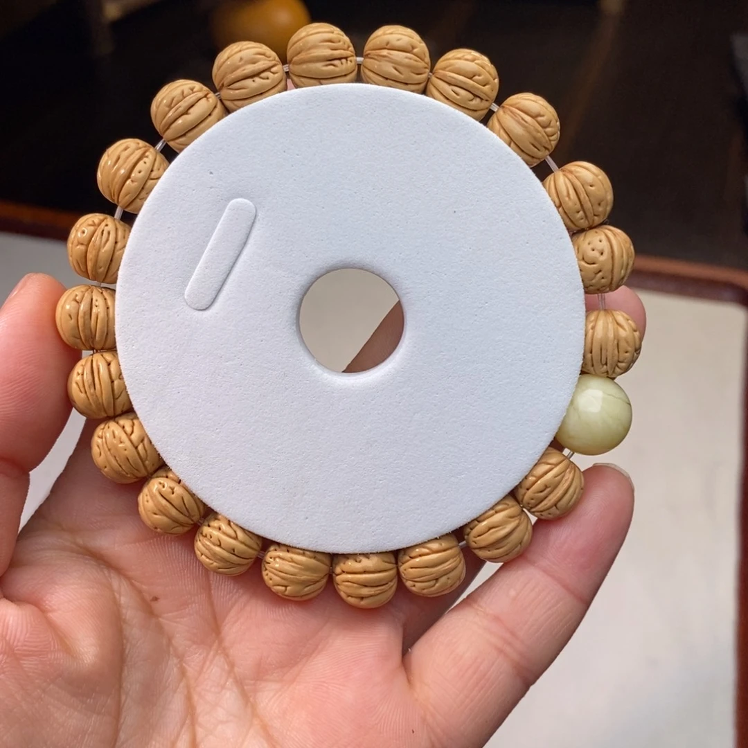 桃核吊坠桃核手串1.2【水晶脐王】