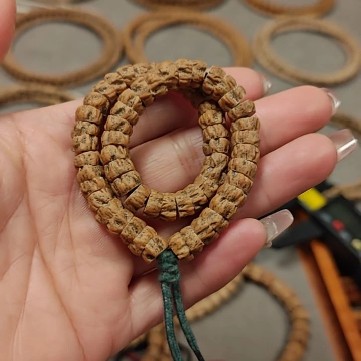 柏香籽/百香籽吊坠手持