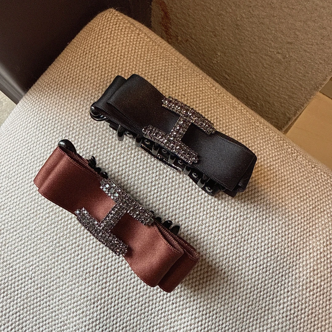 高级感蝴蝶结水钻字母双齿香蕉夹发饰韩式东大门竖夹后脑勺马尾夹