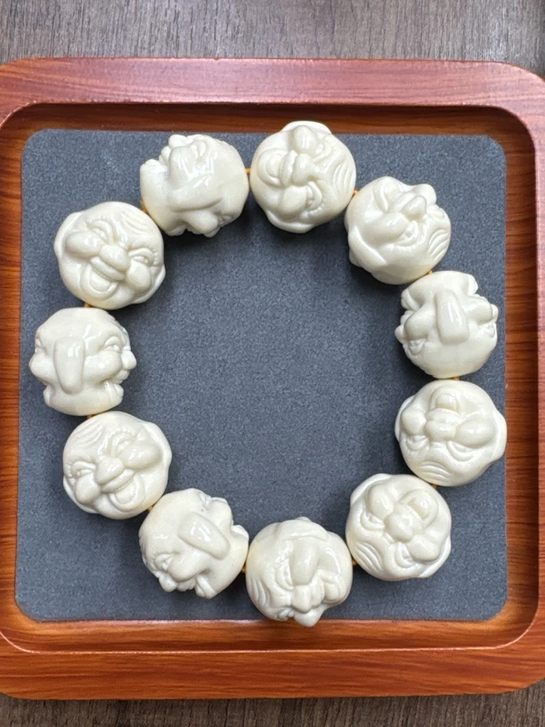M416 白色雕刻佛头工艺品手串