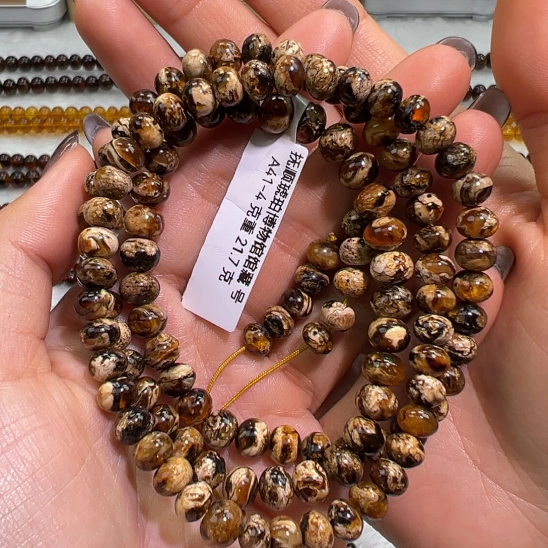 琥珀未镶嵌手串抚顺琥珀干白花7m