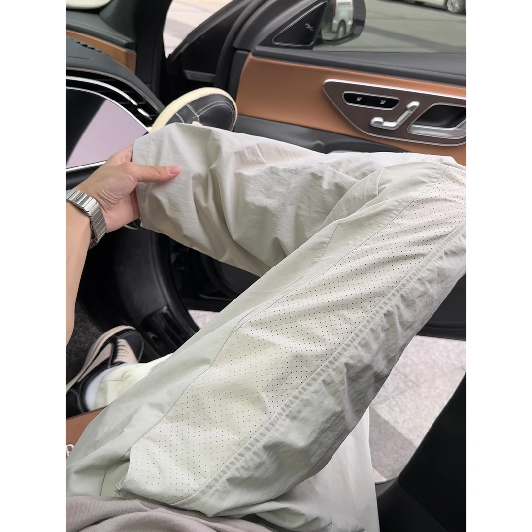 夏季凉感透气速干休闲裤百搭垂感直筒打孔拼接冰丝长裤96001