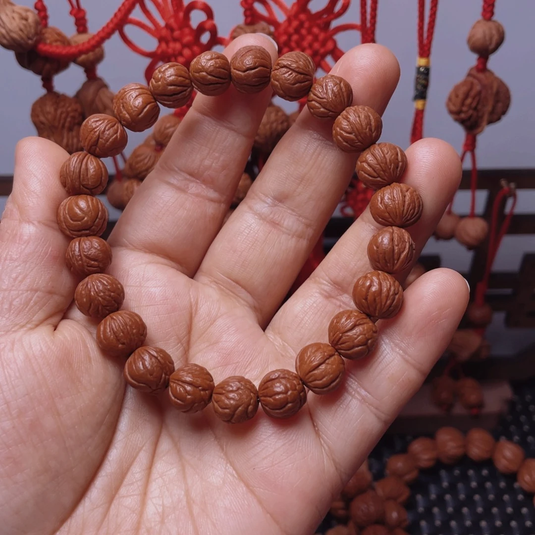 木质类龙纹桃枭手串