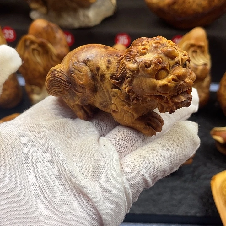 彭***动柏木（崖柏）貔貅手把件