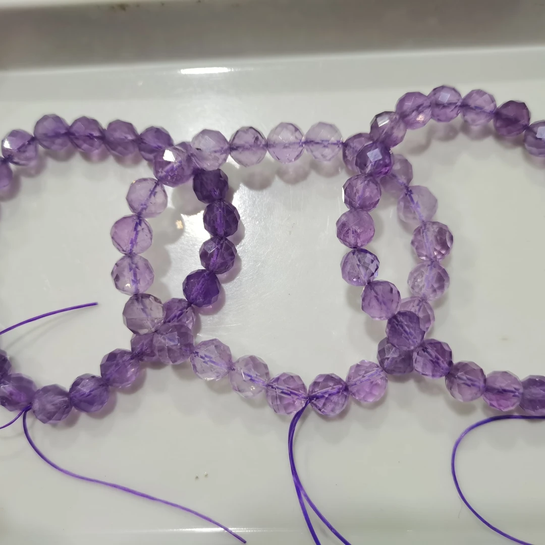 天然紫水晶8mm大小有微棉絮多边折射面纯实物图拍摄