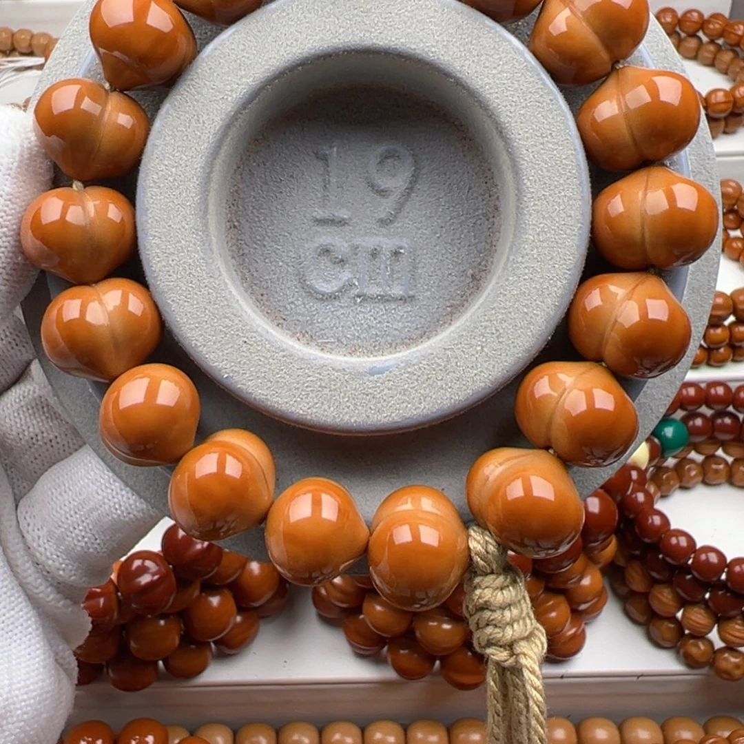 卞***君猴头核桃吊坠大屁桃