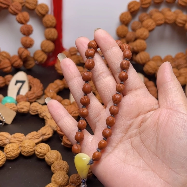 文玩核桃吊坠农****。核桃手串