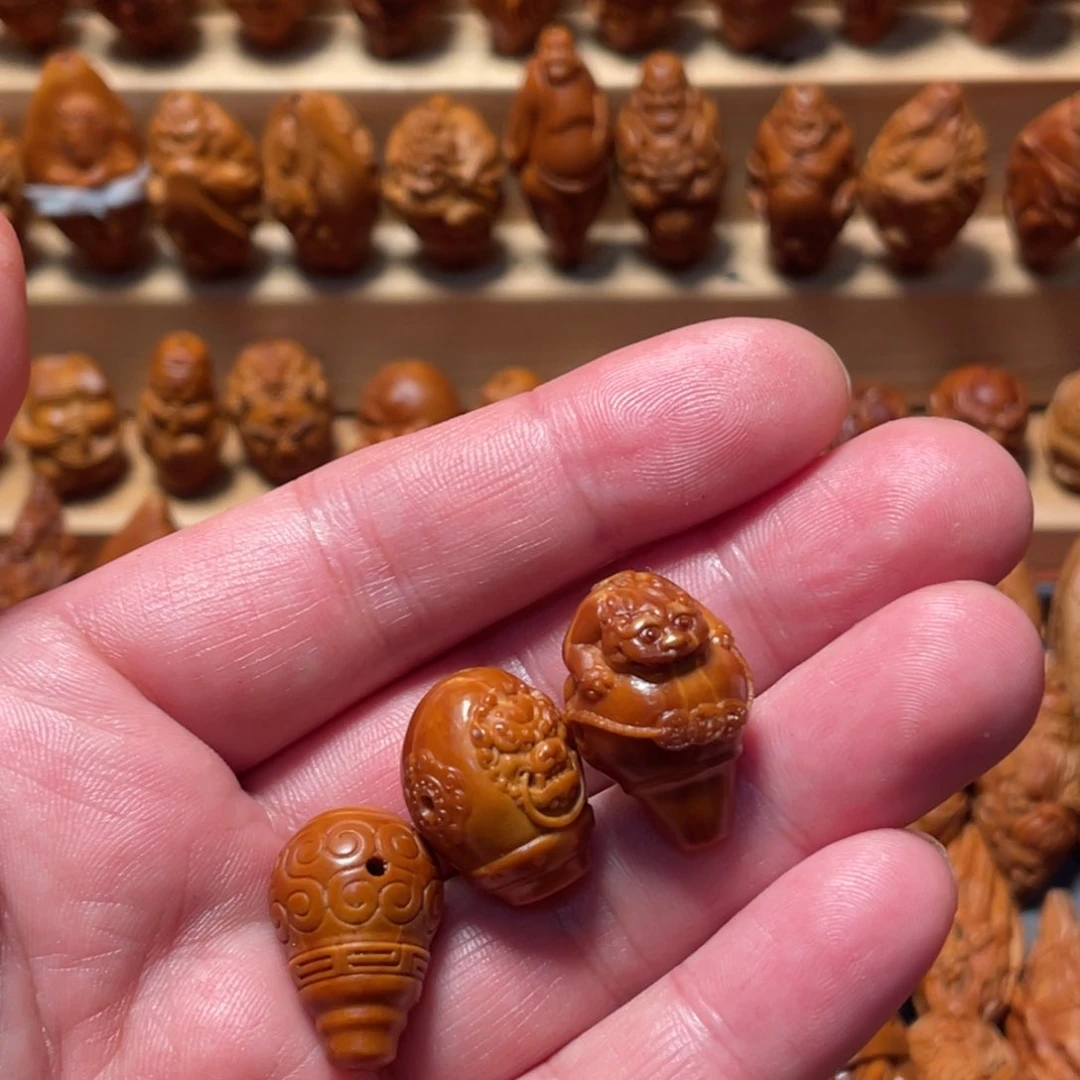 橄榄核吊坠家**宝三通3个