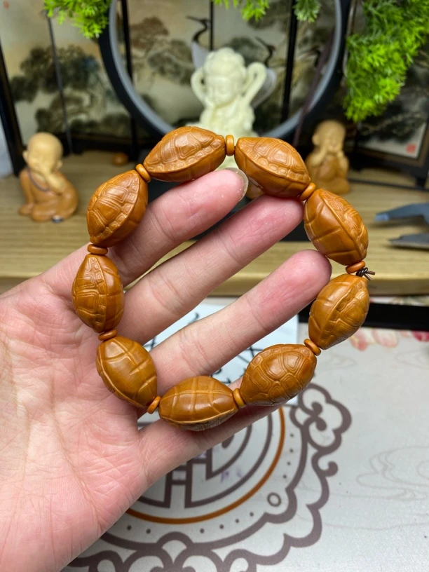 橄榄核雕工艺手串富甲宇