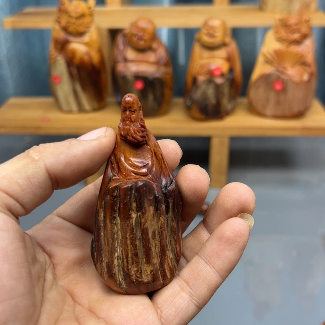 鼎***料木崖柏木摆件手把件