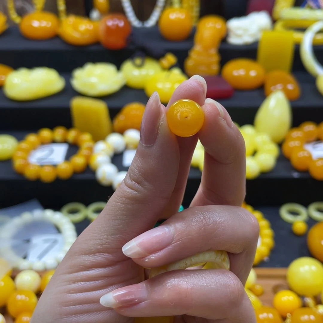 刘***鸡油黄款卡12老型珠单株一颗