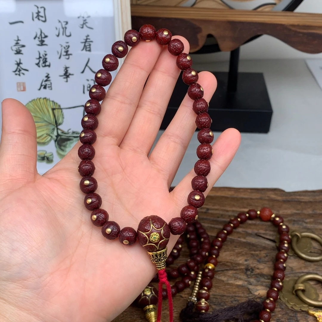 凤眼菩提吊坠8.8 带钉 手持