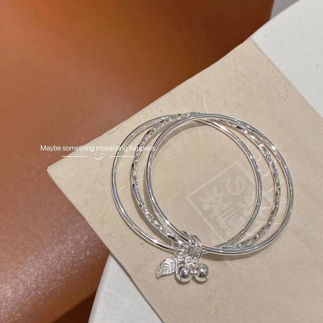 足银999轻奢小众设计年轻款实心手环叶子三环铃铛手镯女