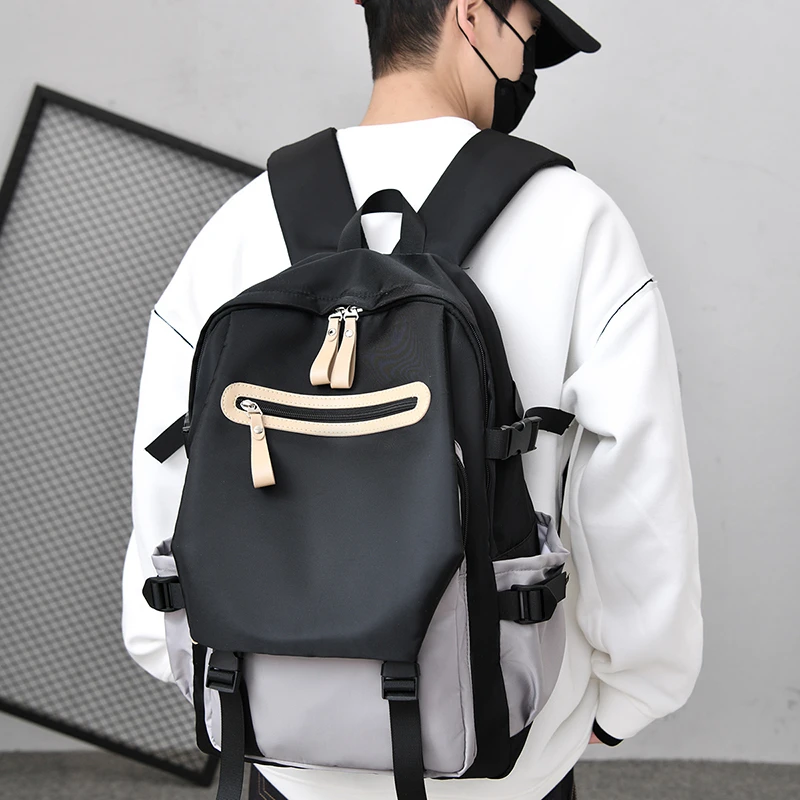 减负护脊书包男生高中生大容量双肩包初中生大学生休闲旅行背包女