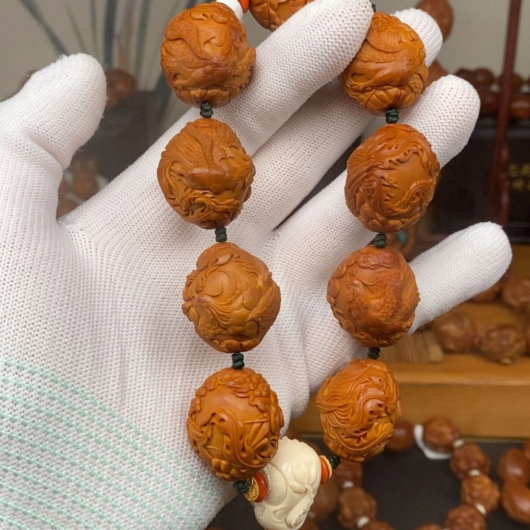手串橄榄核许忠英老师凤穿牡丹
