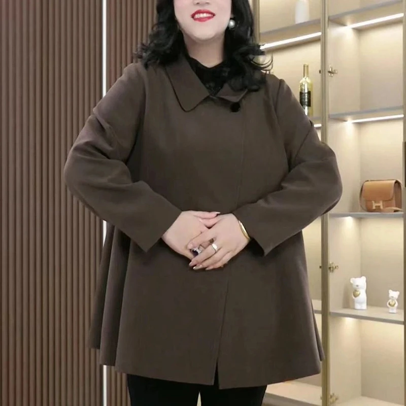 2025年春季新款大码女装高级感外套简约翻领宽松显瘦斗篷式风衣女
