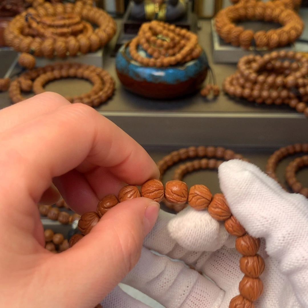 本***本手串桃核秦岭龙纹