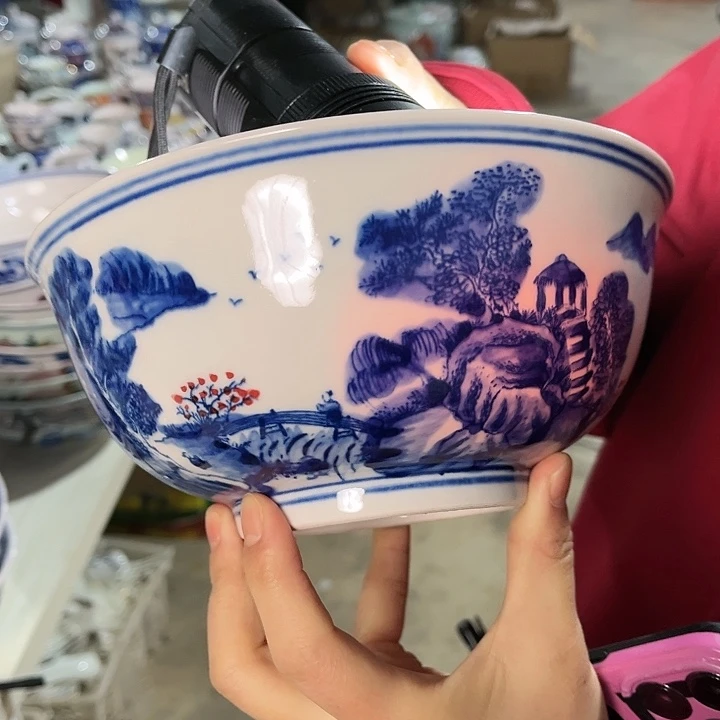 瓷片////直径20厘米。红西西。