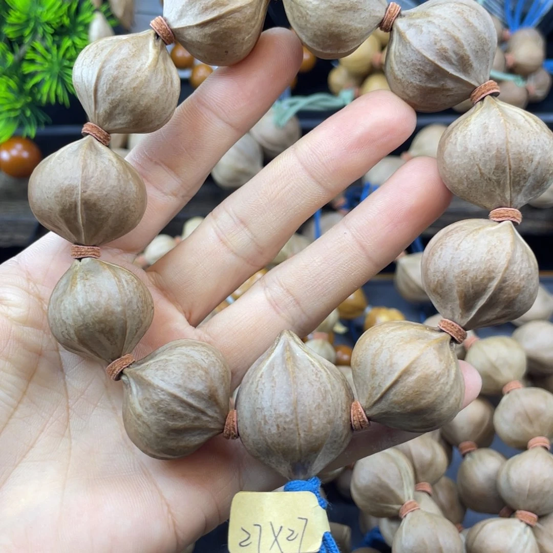 橄榄核吊坠四花老料27x27