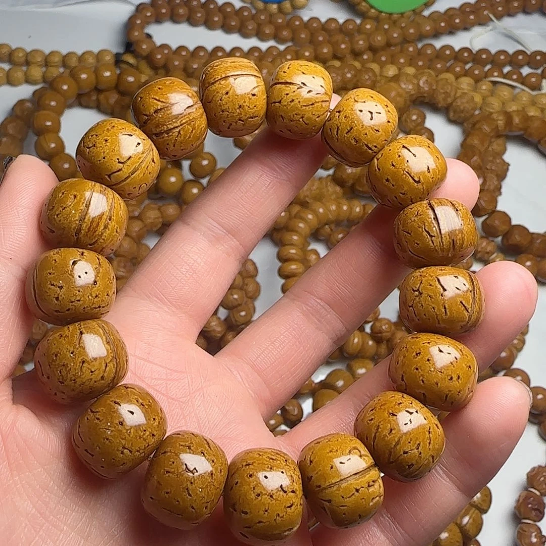 小***哥非洲檀香无事牌精品桃核手串