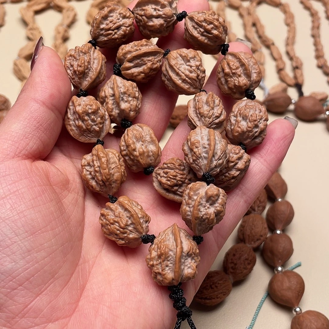 ****华桃核手串蛤蟆手持