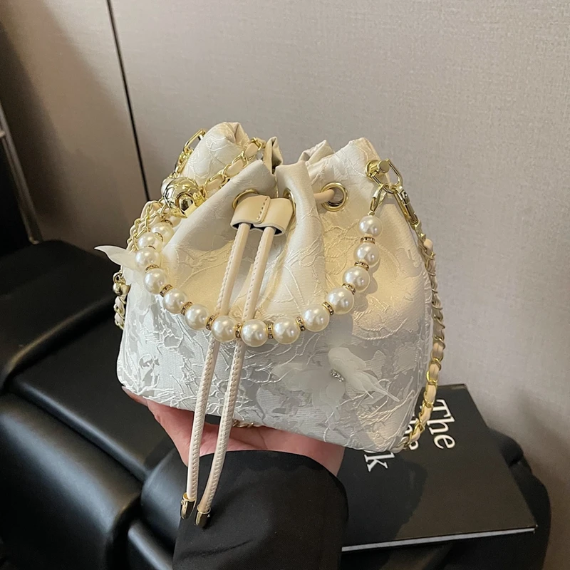 新中式国风帆布包包女2025新款夏天时尚链条斜挎包超火手提水桶包