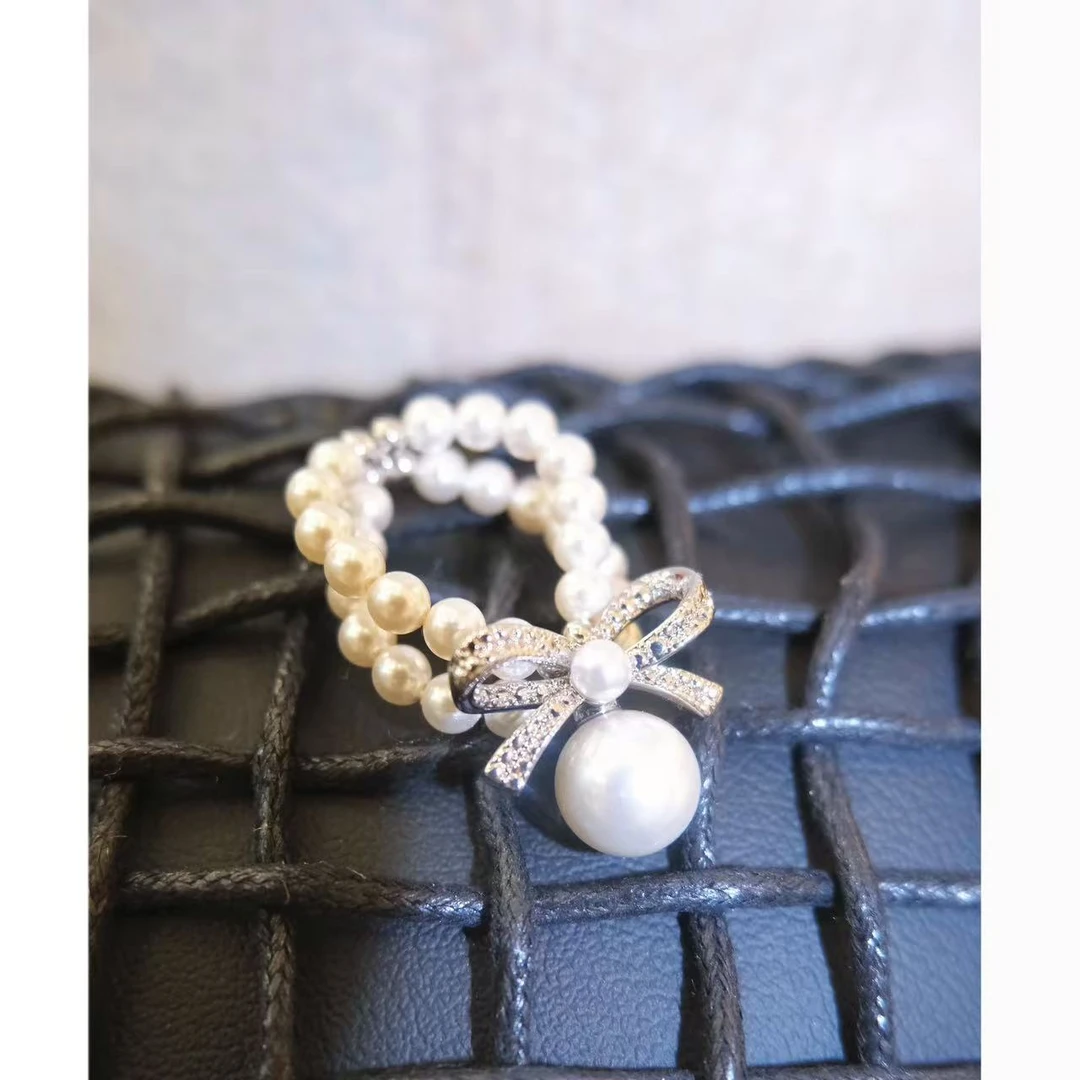 铜合金仿珍珠戒指 小众设计百搭蝴蝶结弹力戒指46244