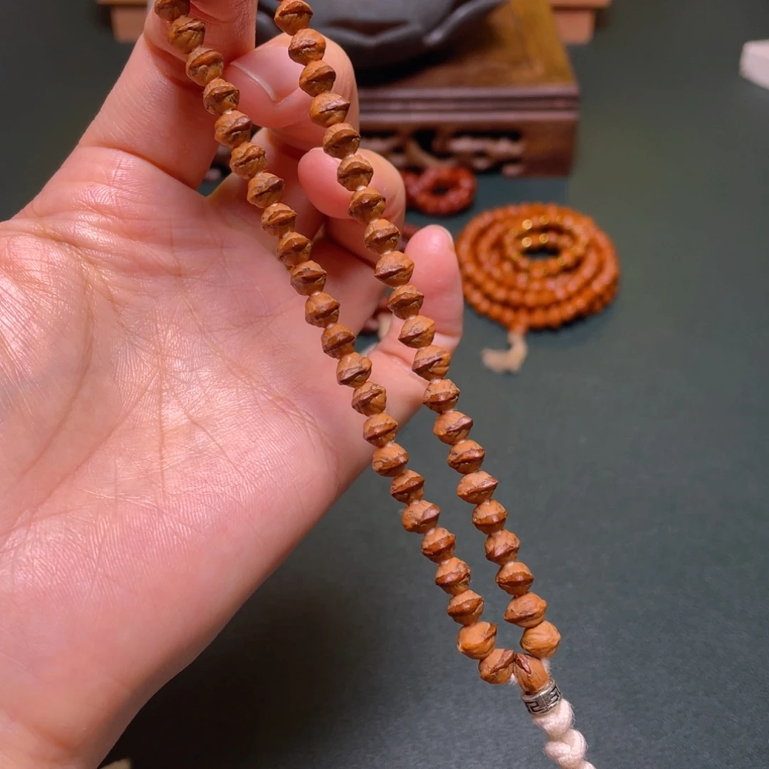 吊坠柏香籽/百香籽迷你红牙手持