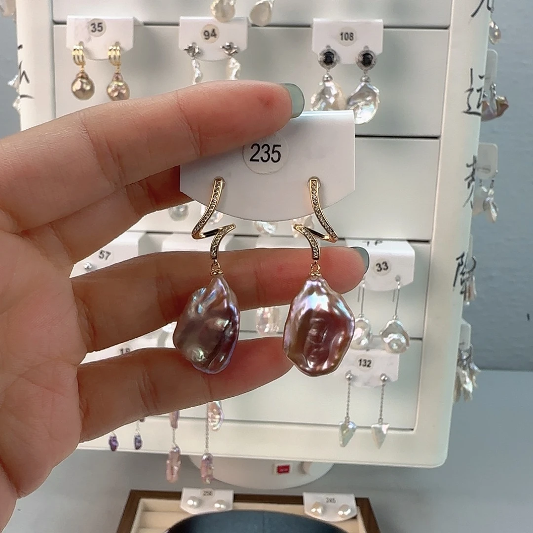 诗***诗非金属淡水花瓣耳饰