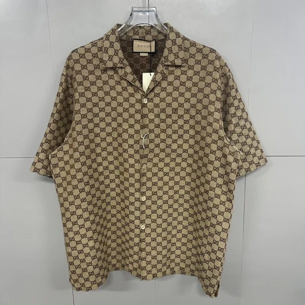 全新未使用  Gucci古驰 满印logo短袖 50码 D14402