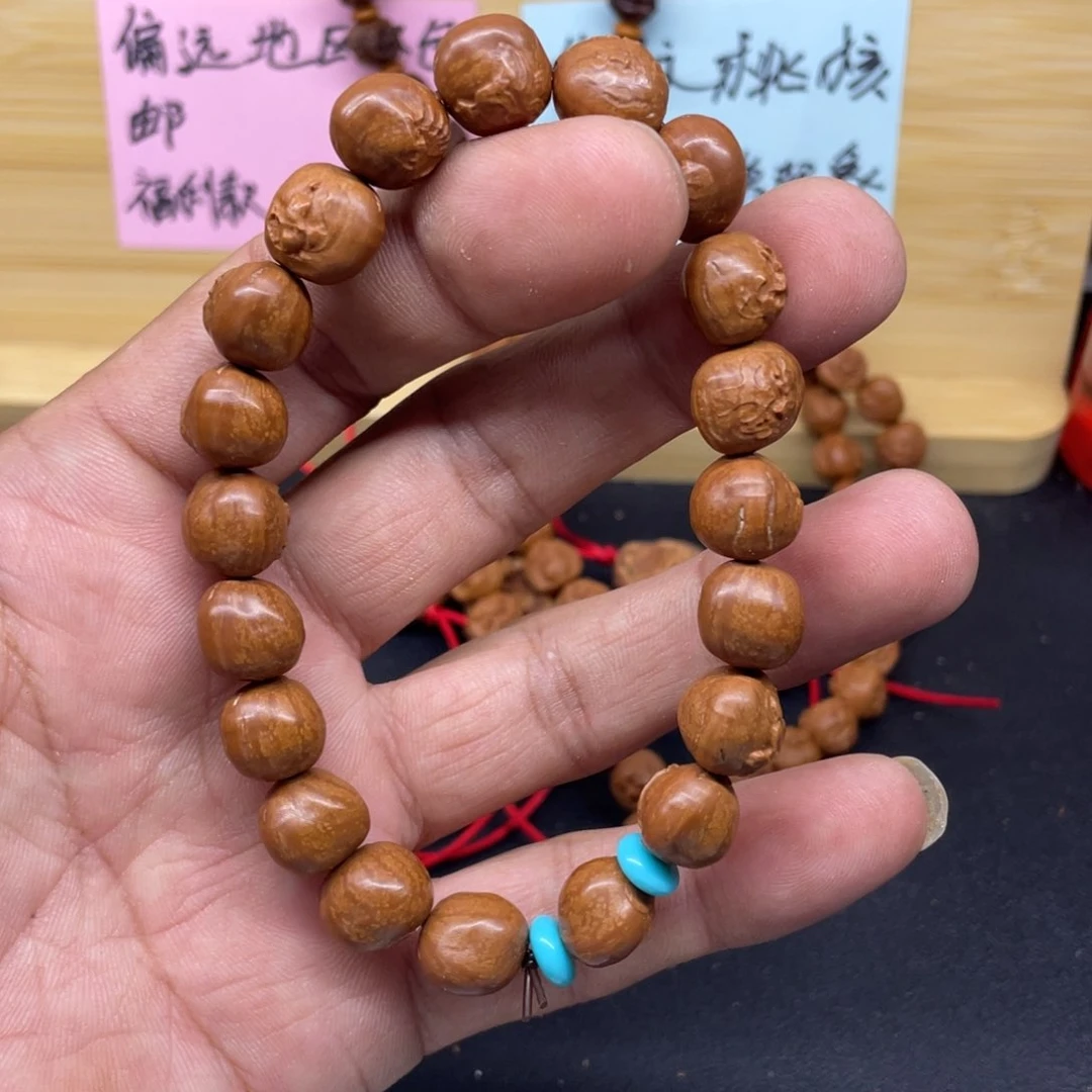 龙纹桃核无相手串