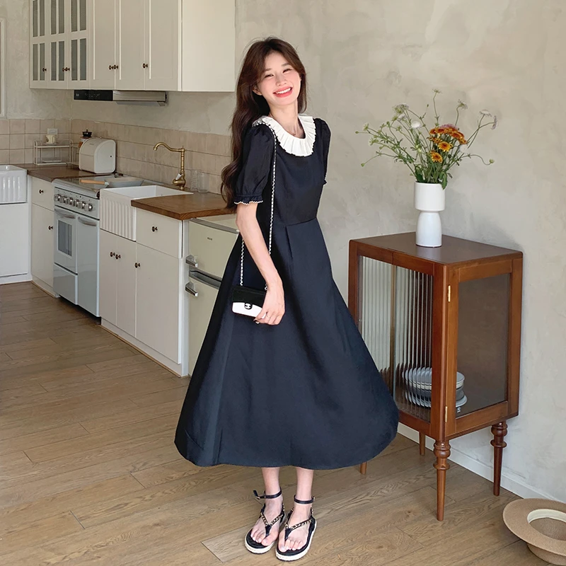 黑色法式赫本风长裙女2025夏季新款蕾丝拼接气质高级感收腰连衣裙